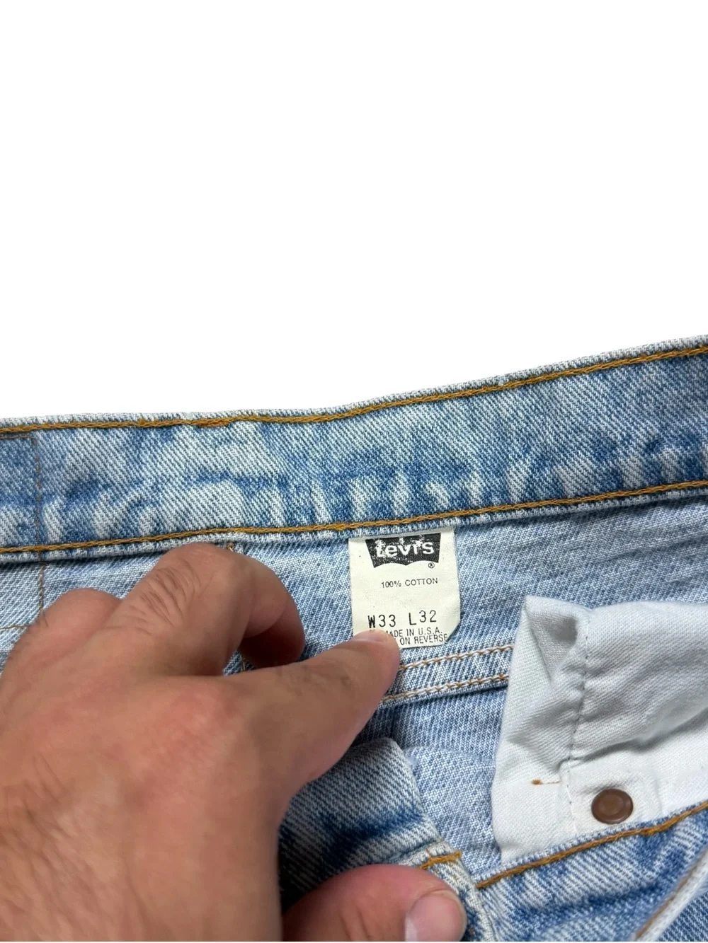 Vintage 90s Levi’s 550 Made In USA Light Wash Elongated Jean Shorts Size 33